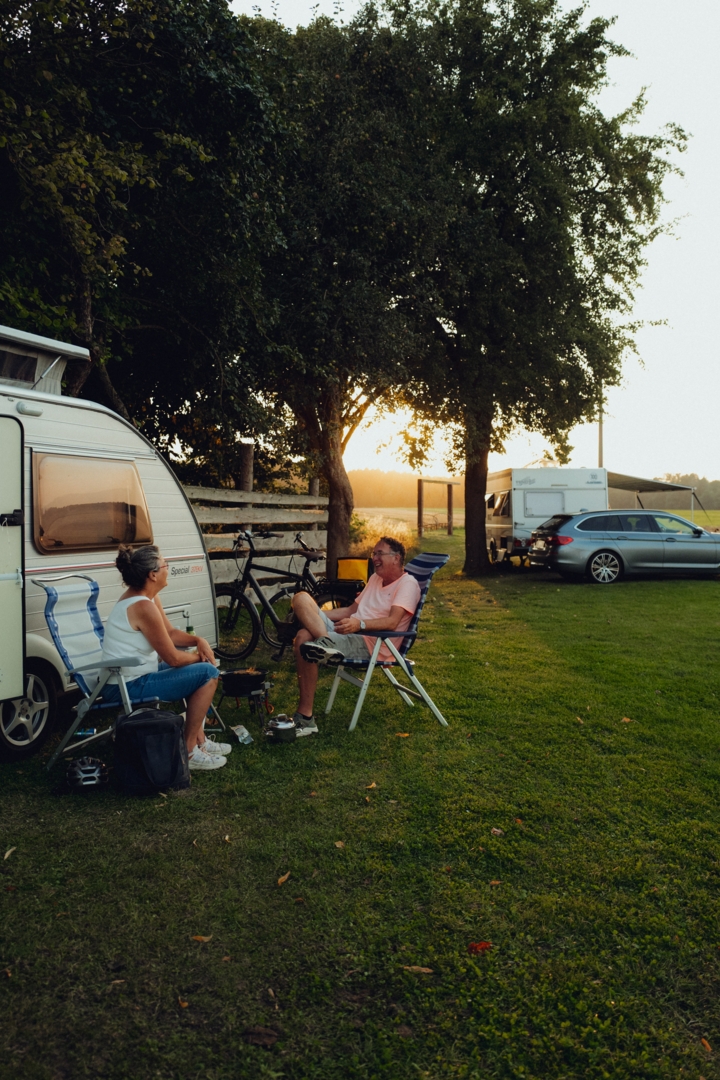 Camp at the edge of the field with a fantastic view