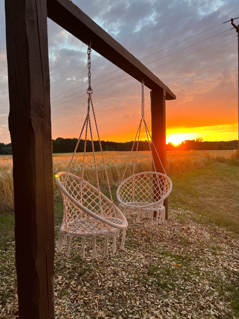Camp at the edge of the field with a fantastic view